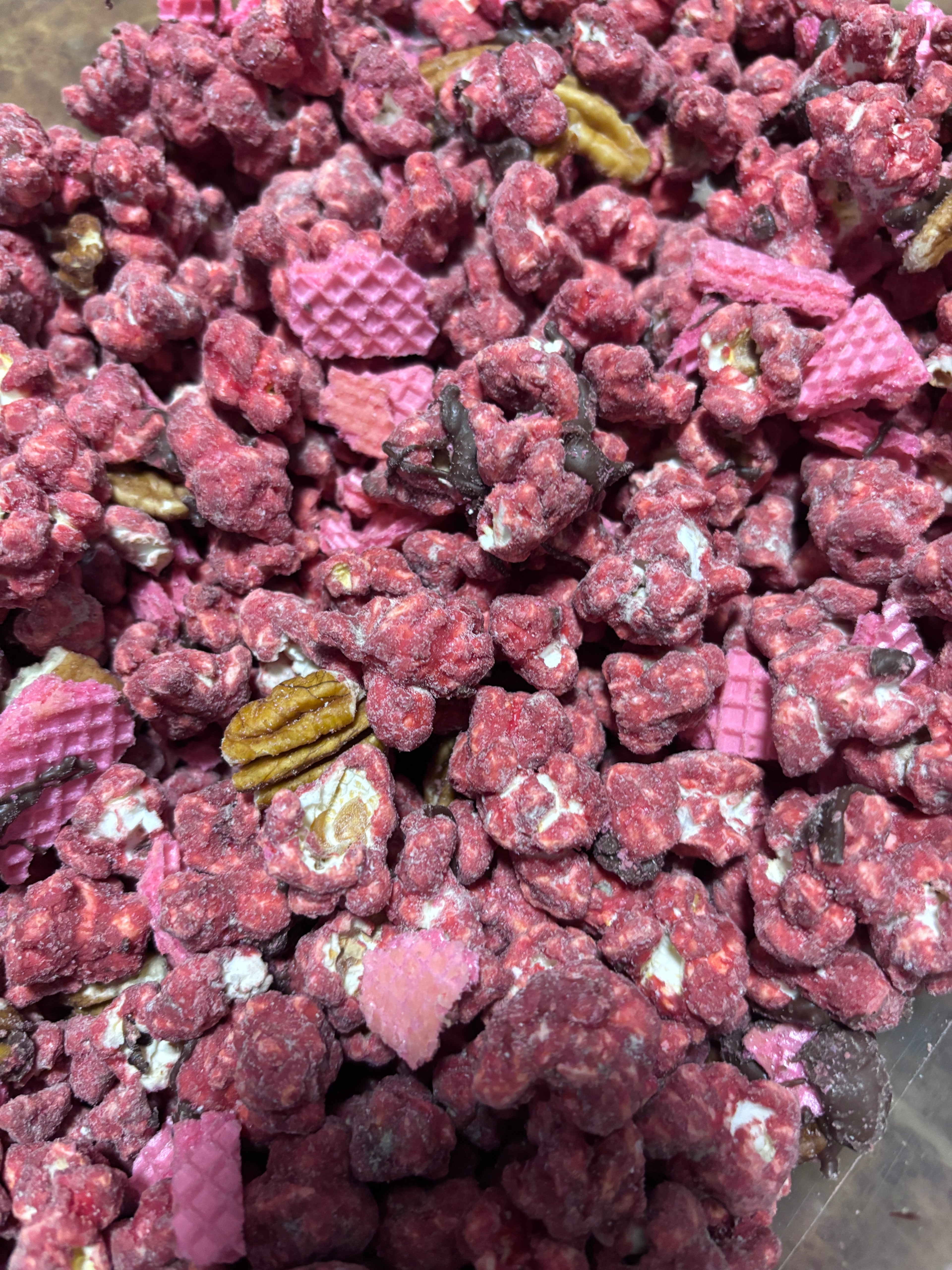 Close up of our red velvet popcorn mix before put in a container.